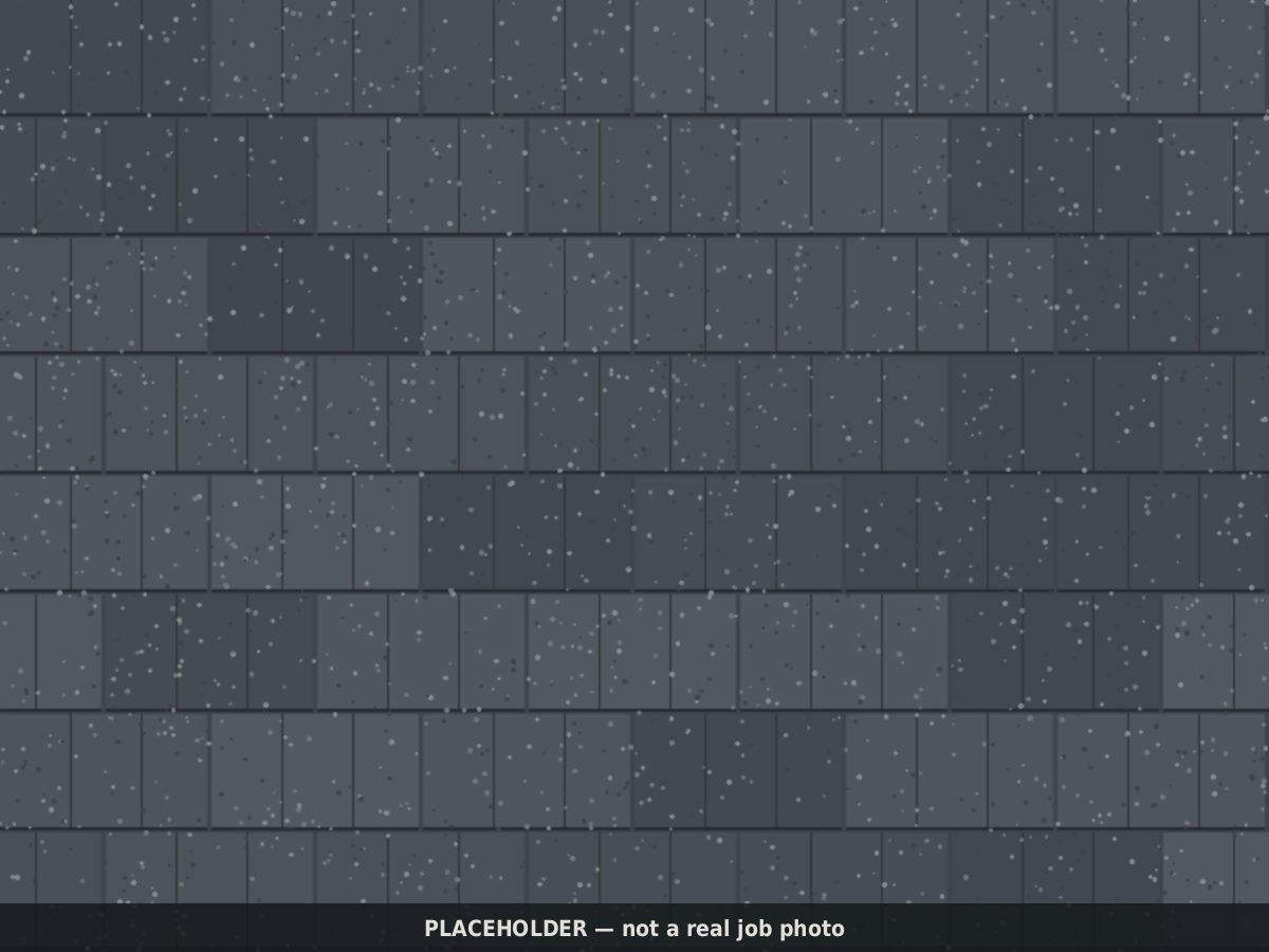 Drawn placeholder: close-up of dark shingle courses around a repaired section